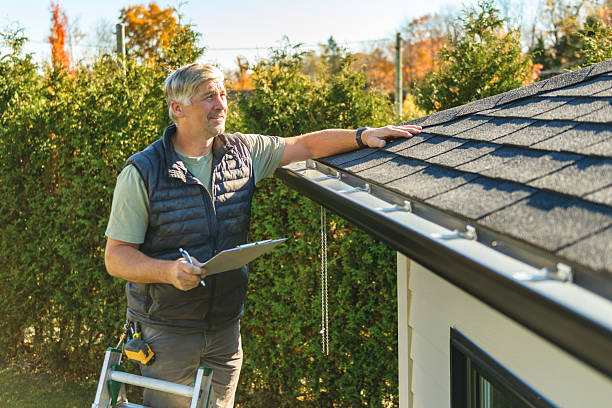 Professional Hail Damage Roof Repair technician working in Barnett, MO